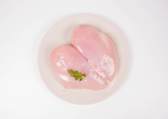  Raw chicken breast on a white background