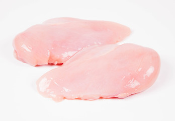  Raw chicken breast on a white background