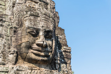 Fototapeta na wymiar Smile face stone at bayon temple in angkor thom siem reap cambodia