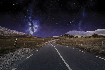 asphalt road over night sky or space