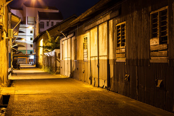 Urban city alley at night in asia