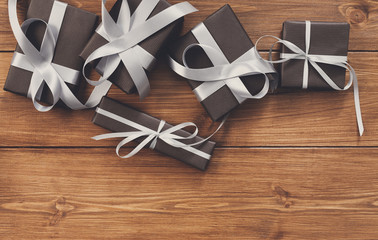 Lots of Gift boxes on wood, christmas presents in paper