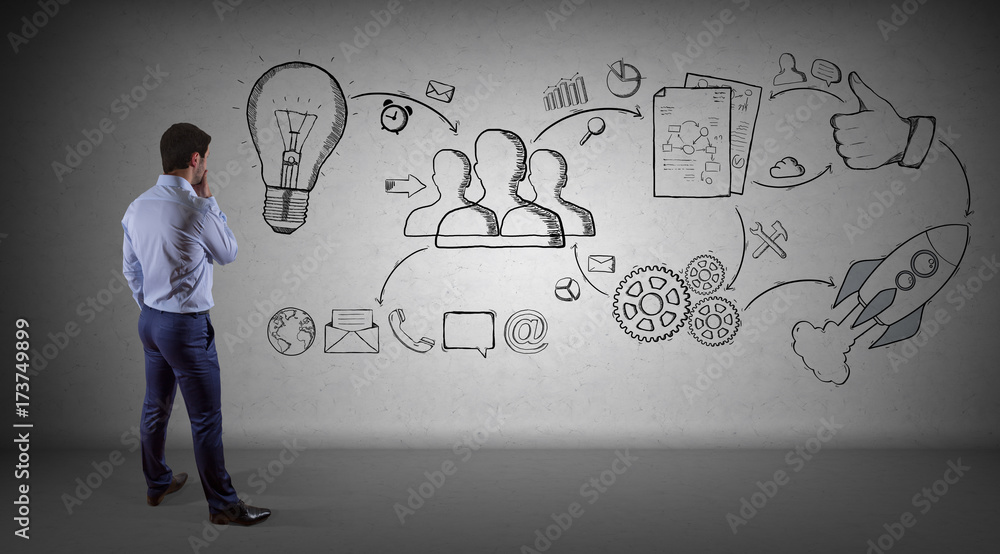 Poster businessman watching a project sketch on a wall 3d rendering