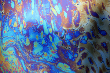 colorful oil stain background.