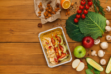 Fototapeta na wymiar Healthy food delivery background, lunch box on rustic wood