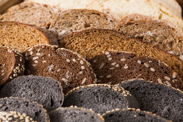 Bakery concept. Plenty of sliced bread background