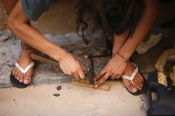 Man at work in the small handicraft workshop