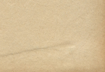 Fototapeta na wymiar Recycled light brown or beige paper texture background