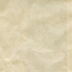 Recycled, creased light brown or beige paper texture background - 173755055