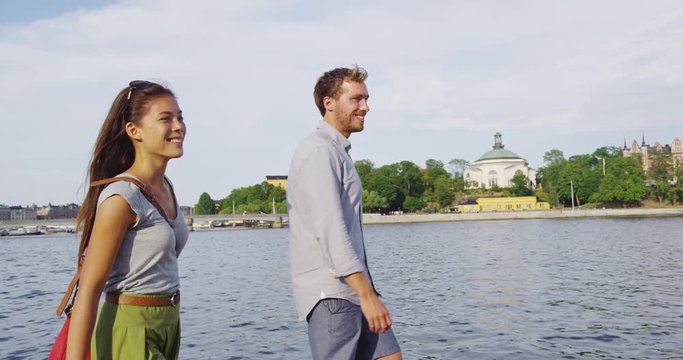 People in Stockholm Sweden - Young couple walking downtown. Man and woman in love enjoying walk in Stockholm, Sweden, Scandinavia.