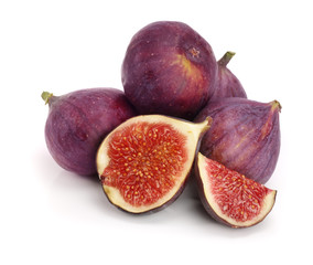 fig fruits with half isolated on white background