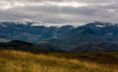 snowy mountain ridge in late autumn