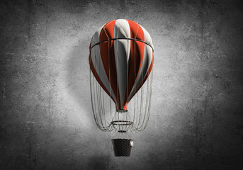 Obraz premium Flying hot air balloon in the room.