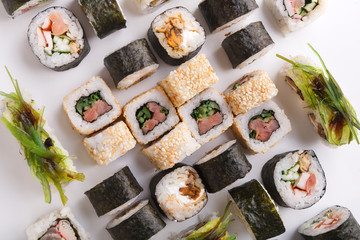 Set of sushi, maki and rolls isolated on white background closeup