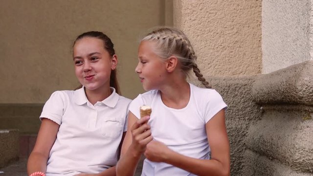 Young women taking photo of ice cream on  Girl photographing outdoors in summer sunshine Girls enjoying 
