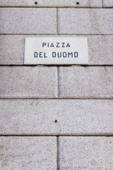 A sign that says "Piazza Del Duomo", which translated from Italian means the "Church Square"