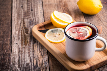 Hot  fruit tea with lemon slices