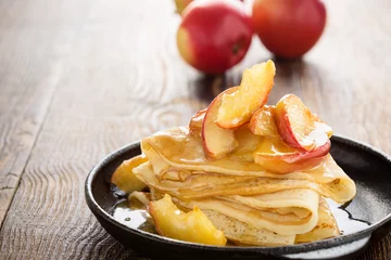 Zelfklevend Fotobehang Homemade  crepes served with caramelized apples © istetiana