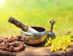 Tibetan copper singing bowl and rosary