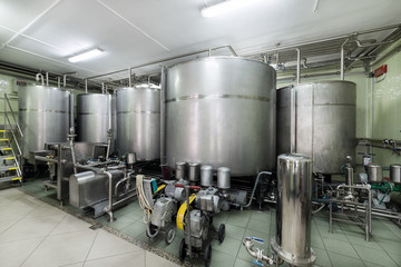 Industrial equipment, metal tanks in the liquor factory.