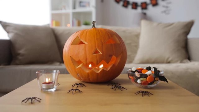 jack-o-lantern and halloween decorations at home