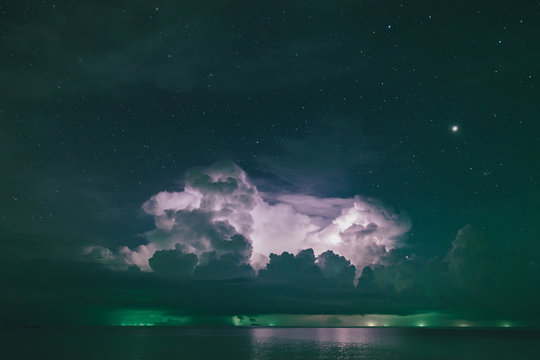 Storm over the sea at night