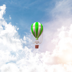 Flying hot air balloon in the air.