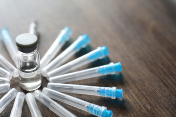 Ampoule and needles from a medical syringe