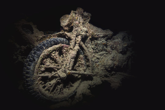 Motorbike underwater inside of a SS Thistlegorm shipwreck in Suez Canal  