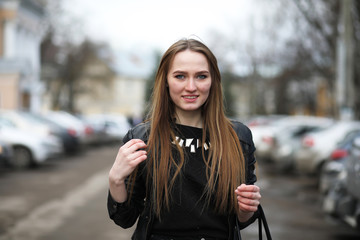 Obraz premium Young cute girl on a walk in the city