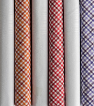 Bots of Plaid and White Cloth