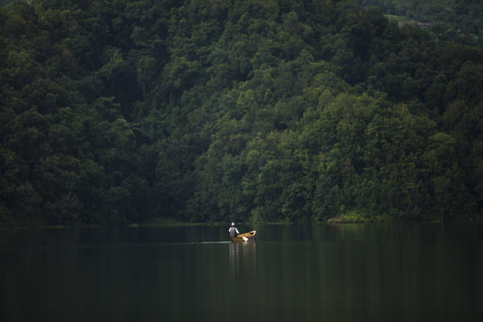 A fisherman in Begnas Lake.