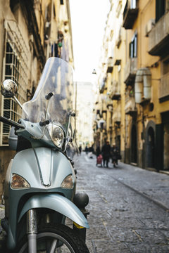 Motorcycle parked in italian street in Naples