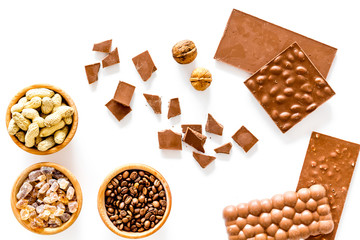Ingredients for chocolates on white background top view