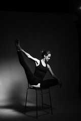 Fototapeta na wymiar Gymnast on the Chair