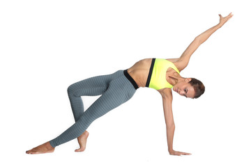 A gymnast performs on the white background element