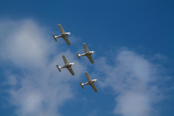 Duster, small old plane for agricultural spraying, flying in the sky
