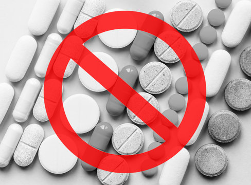 Stop Opioids. Painkillers Crisis And Drug Abuse Concept. Opioid And Prescription Medication Addiction Epidemic. Different Kinds Of Multicolored Pills. Pharmaceutical Medicament Background