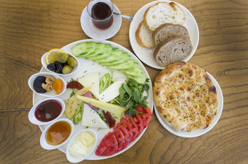 Breakfast plate on wooden table