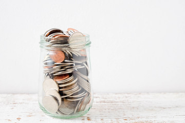 save money for investment concept coin baht thai in the glass jar