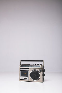 Vintage tape-recorder on white background