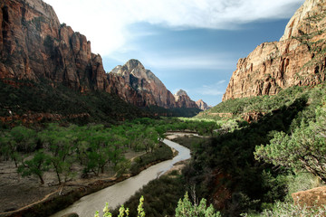 Fototapeta na wymiar View of river flowing through mountains in Zion National Park