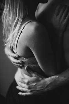 Young Couple In An Intimate Embrace