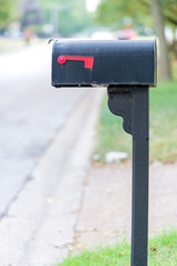 Mailbox with flag down - 173790497