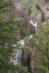 Waterfall flowing through Canyon.