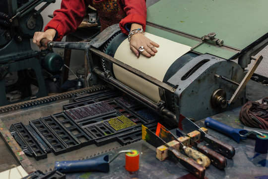 Woman Working in an Old Printing House
