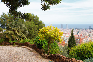 Panoramic view of Barcelona and walk path from Park Guell in a summer day in Spain