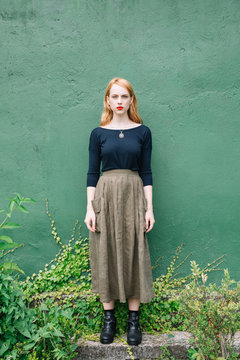 Close-up of red-haired young woman