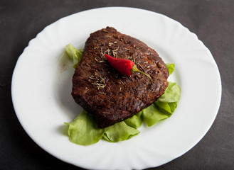 Fried veal steak on a plate