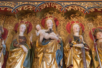 german catholic church with religious details around altar and architecture in september